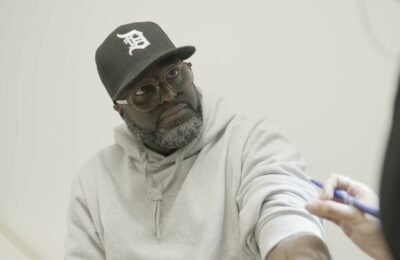 Patient having a private blood test at Clinique Alpa, Palmers Green