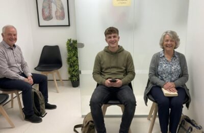 Family in the waiting area at Clinique Alpa for a same day paediatric appointment